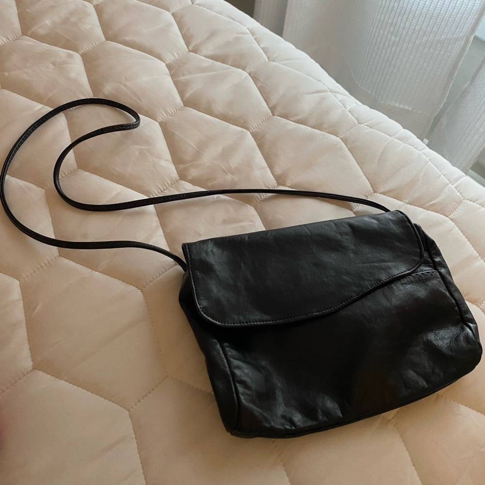 Black leather small bag.  Excellent condition
